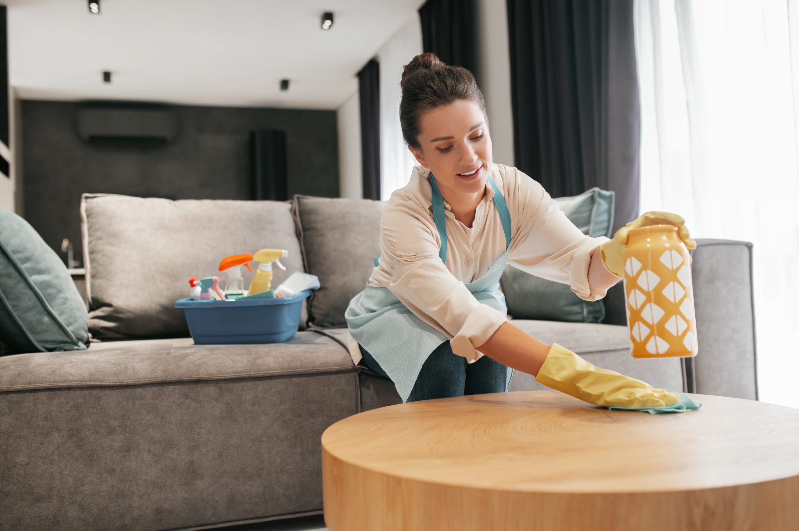 Chores Woman Cleaning Table Surfcase With Disinfector